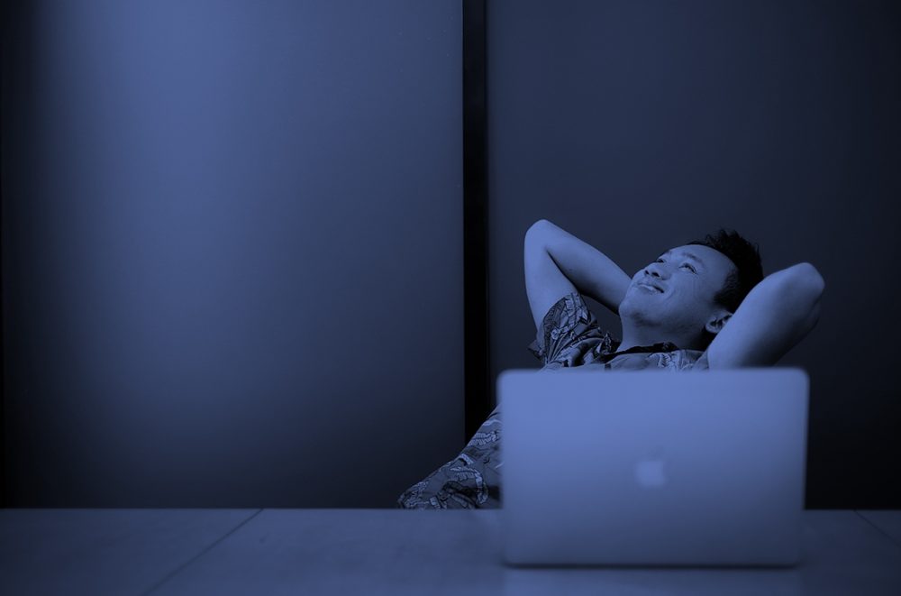 Relaxed at computer